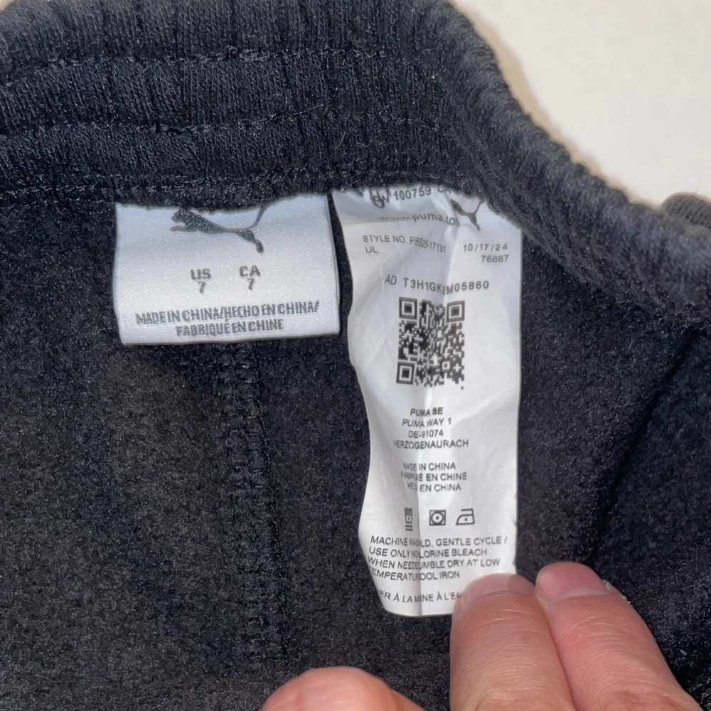 Puma Kids Shorts in Black with Gold Logo - Picture 2 of 5